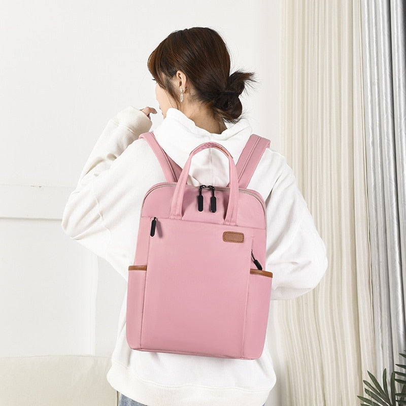 Ergonomic women's anti-theft travel backpack, water-resistant Oxford design, comfortable for long wear.