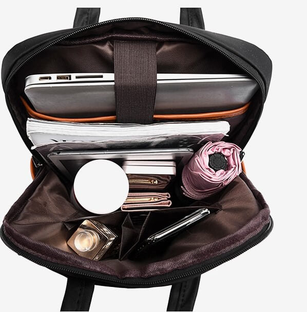 Modern women's anti-theft travel backpack, water-resistant Oxford material, perfect for stylish security.