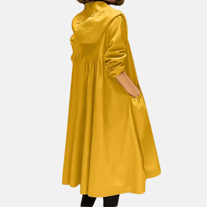 Knee-length women's hooded outerwear jacket in a durable, water-resistant fabric