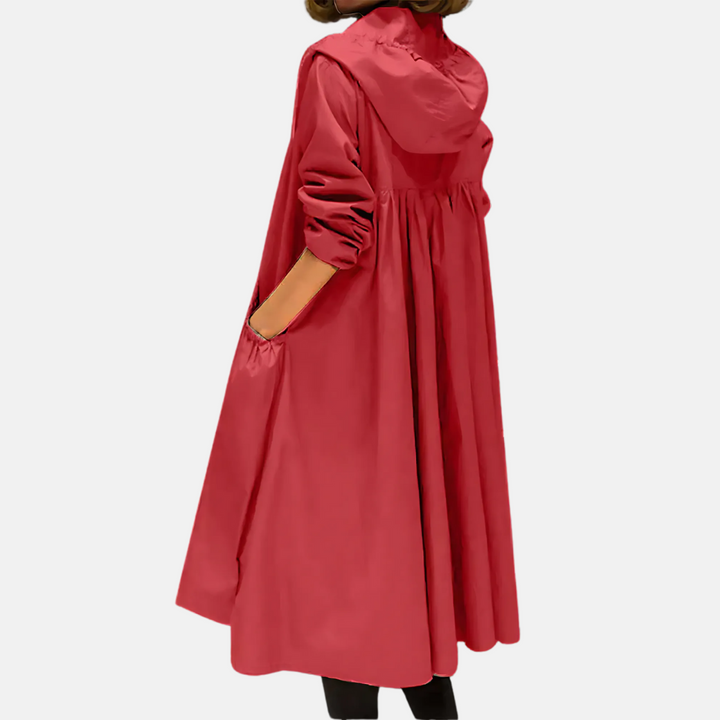 Casual women's spring jacket, hooded and knee-length, offering rain protection
