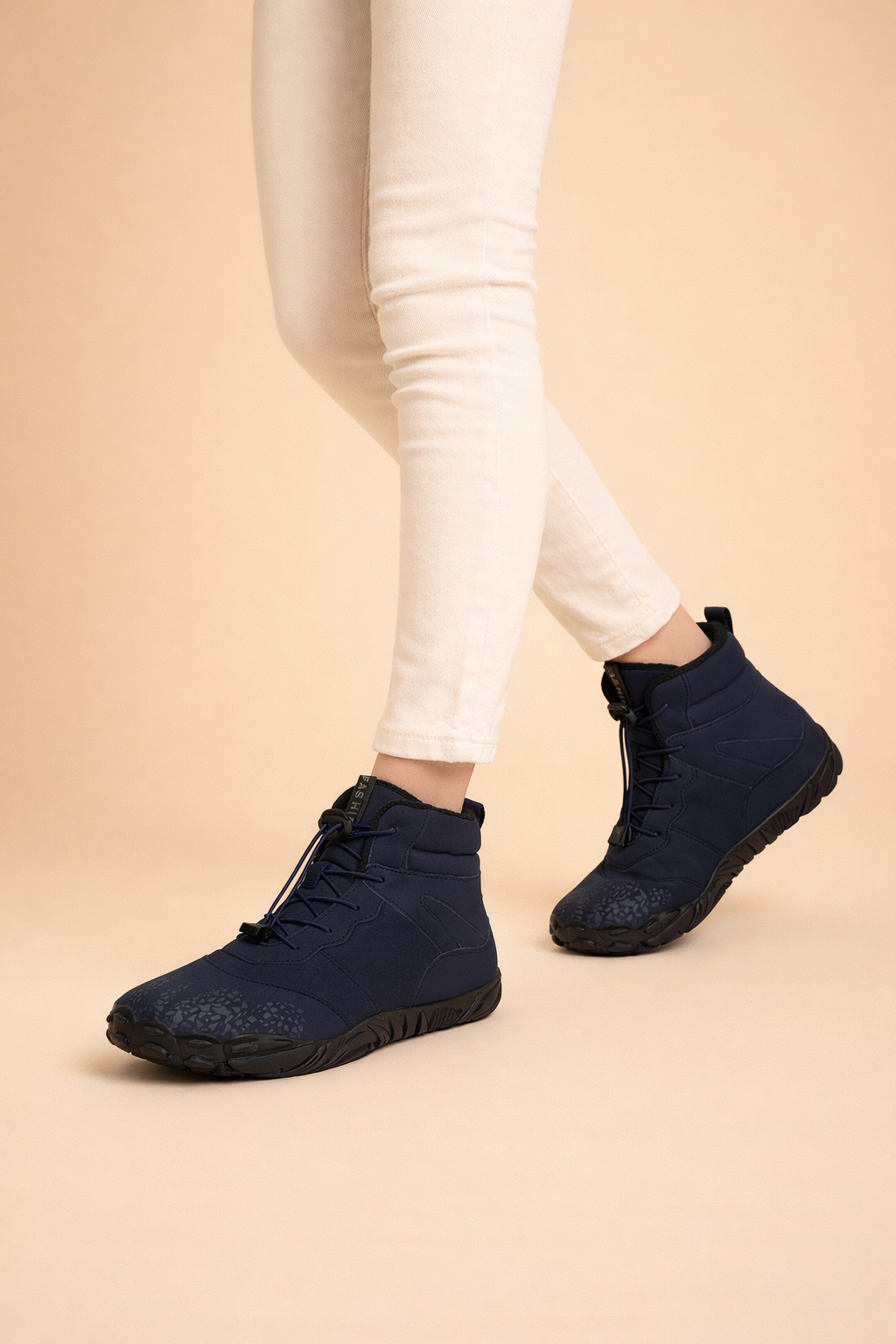 Outdoor-ready women's waterproof barefoot winter boots, providing natural movement & stylish protection.