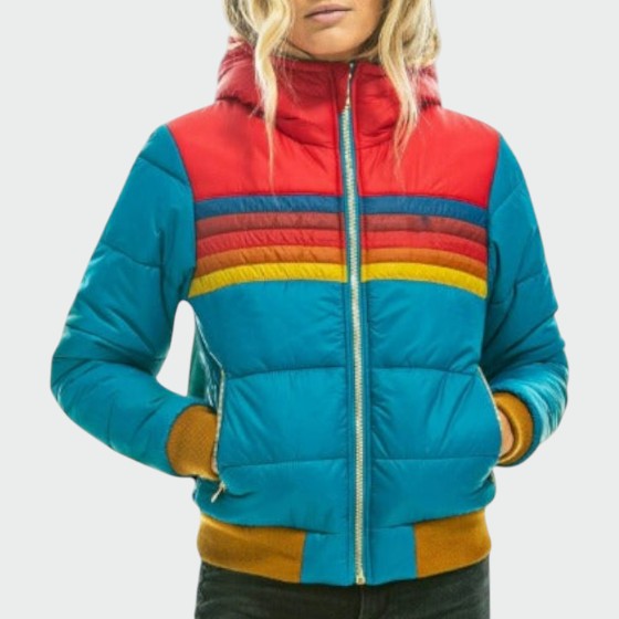 Insulated women's winter coat, hooded, close-up of water-resistant fabric
