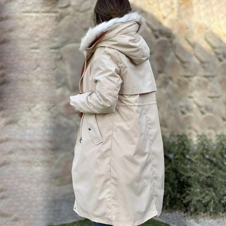 Versatile women's waterproof hooded coat, ideal for all-season outdoor and casual use.
