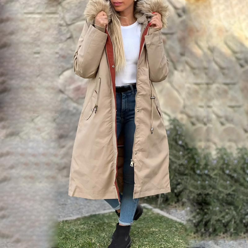 Stylish women's lightweight waterproof hooded jacket, versatile for all-season outdoor activities.