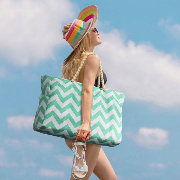 Elegant sandproof women's beach tote, perfect for sunny getaways.