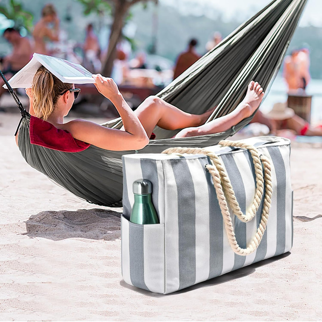 Chic women's sandproof beach bag, oversized and waterproof design.