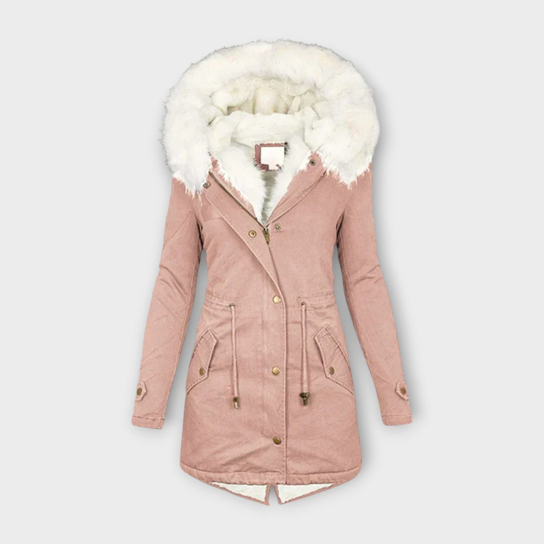 Close-up of the faux fur-lined hood on a women's waterproof winter puffer jacket, warm outerwear.