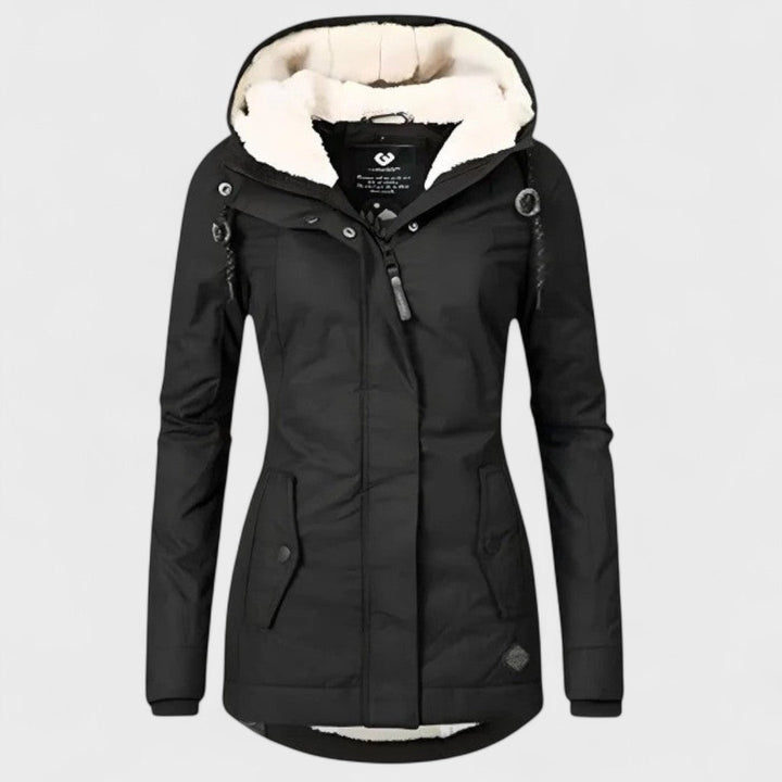 Fashionable women's long winter parka, waterproof outer shell & adjustable hood for ultimate warmth.