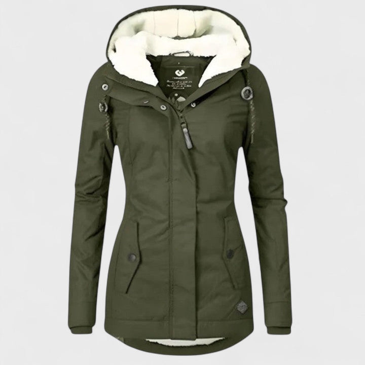 Durable women's waterproof jacket, long design with cozy hood, perfect for snowy winter days.
