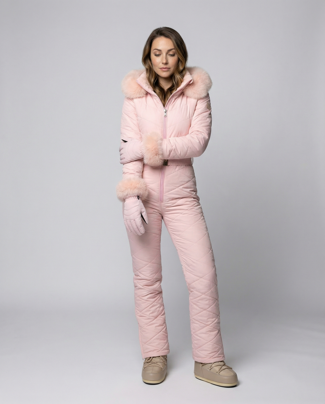 Women's weather-resistant snowboard overall suit, ideal for skiing and cold weather adventures.