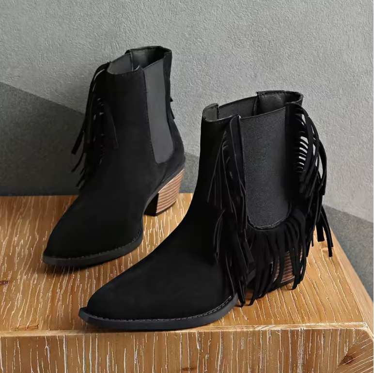 Boho chic women's fringe suede ankle boots with a Western-inspired design and fashion-forward appeal.