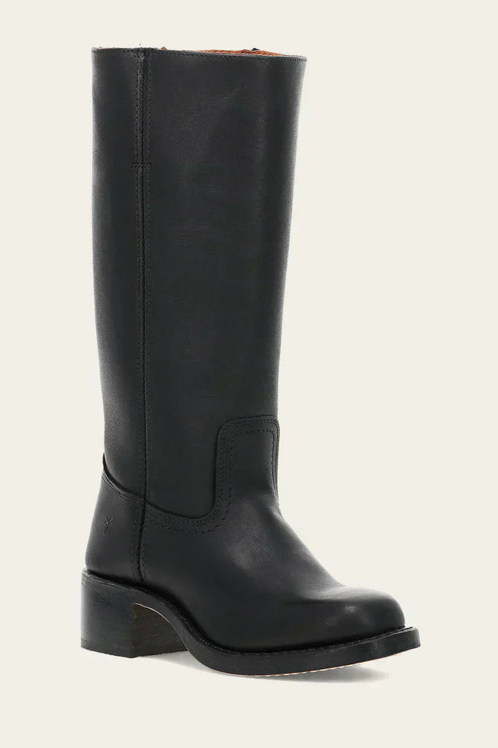 Group of assorted women's leather cowboy boots, showcasing various colors and designs for western wear