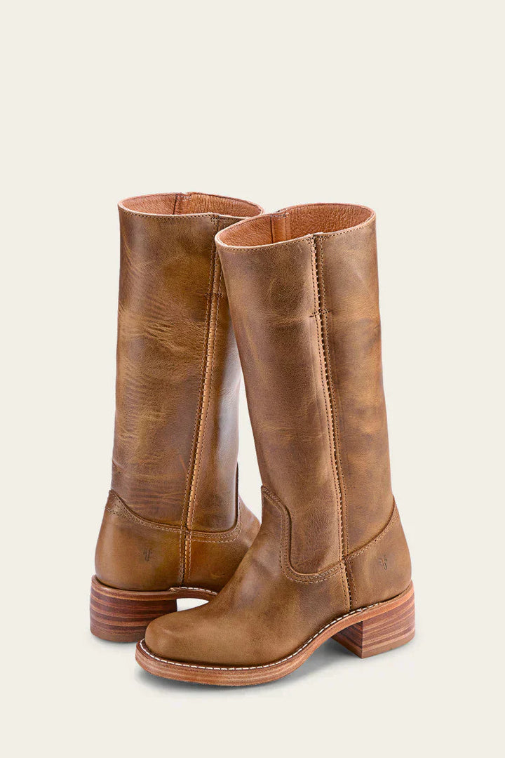 Pair of black leather cowboy boots for women, featuring a pointed toe and robust western style