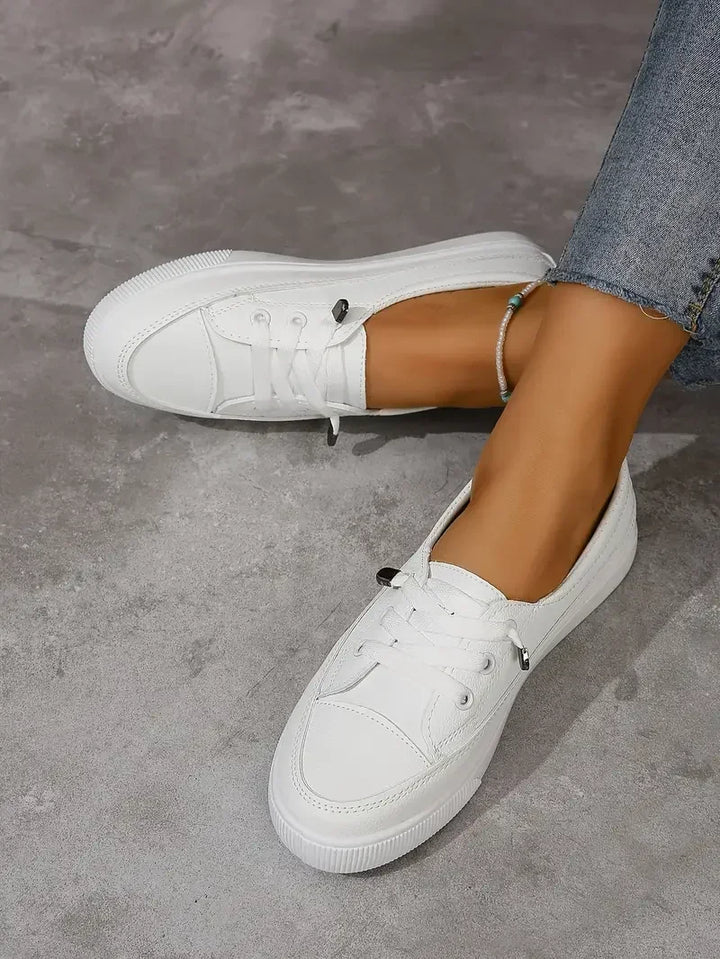 Women's white casual lace-up flats, round toe, perfect for comfortable everyday wear and versatile walking.