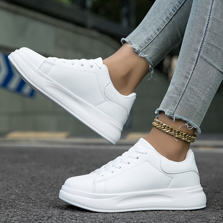 Stylish white leather sneakers for women, a new arrival in casual and comfortable shoes.