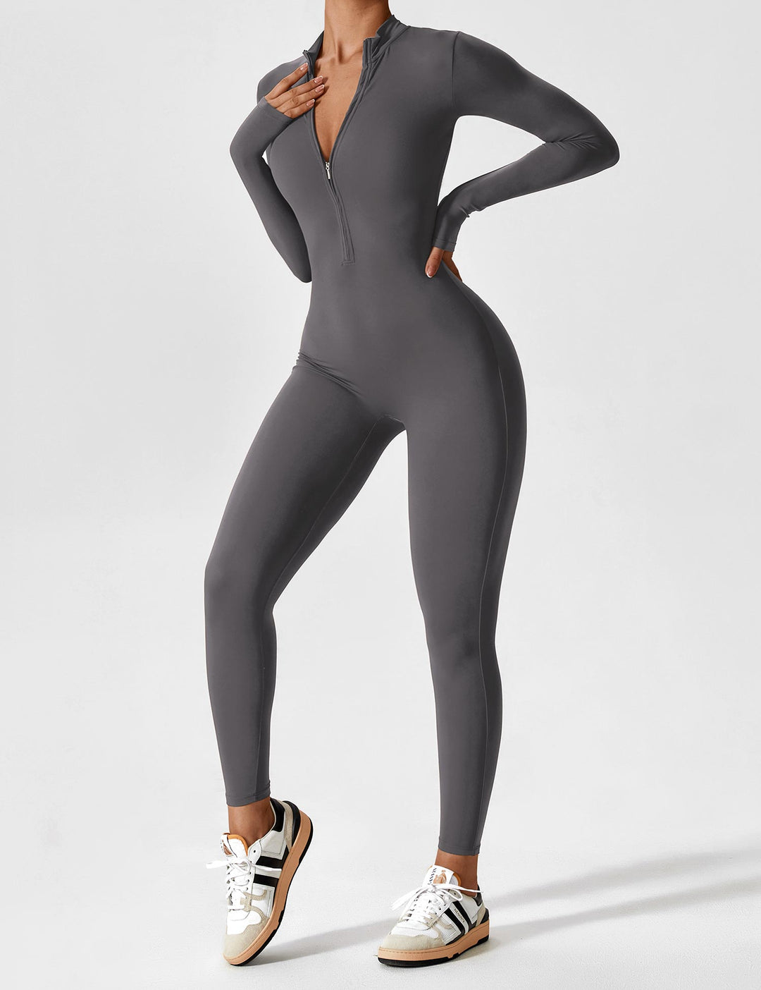 Women's white long sleeve zip lounge set with open zipper, relaxed summer style