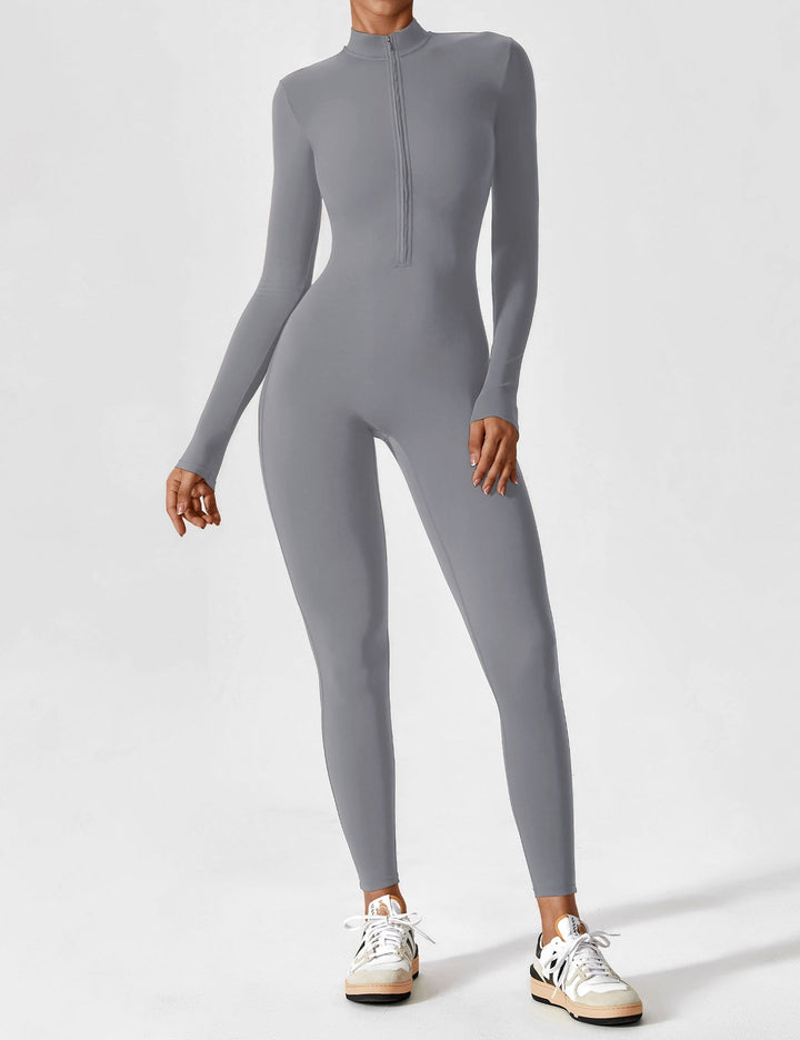 Close-up of zipper pull on women's long sleeve lounge top, quality detail