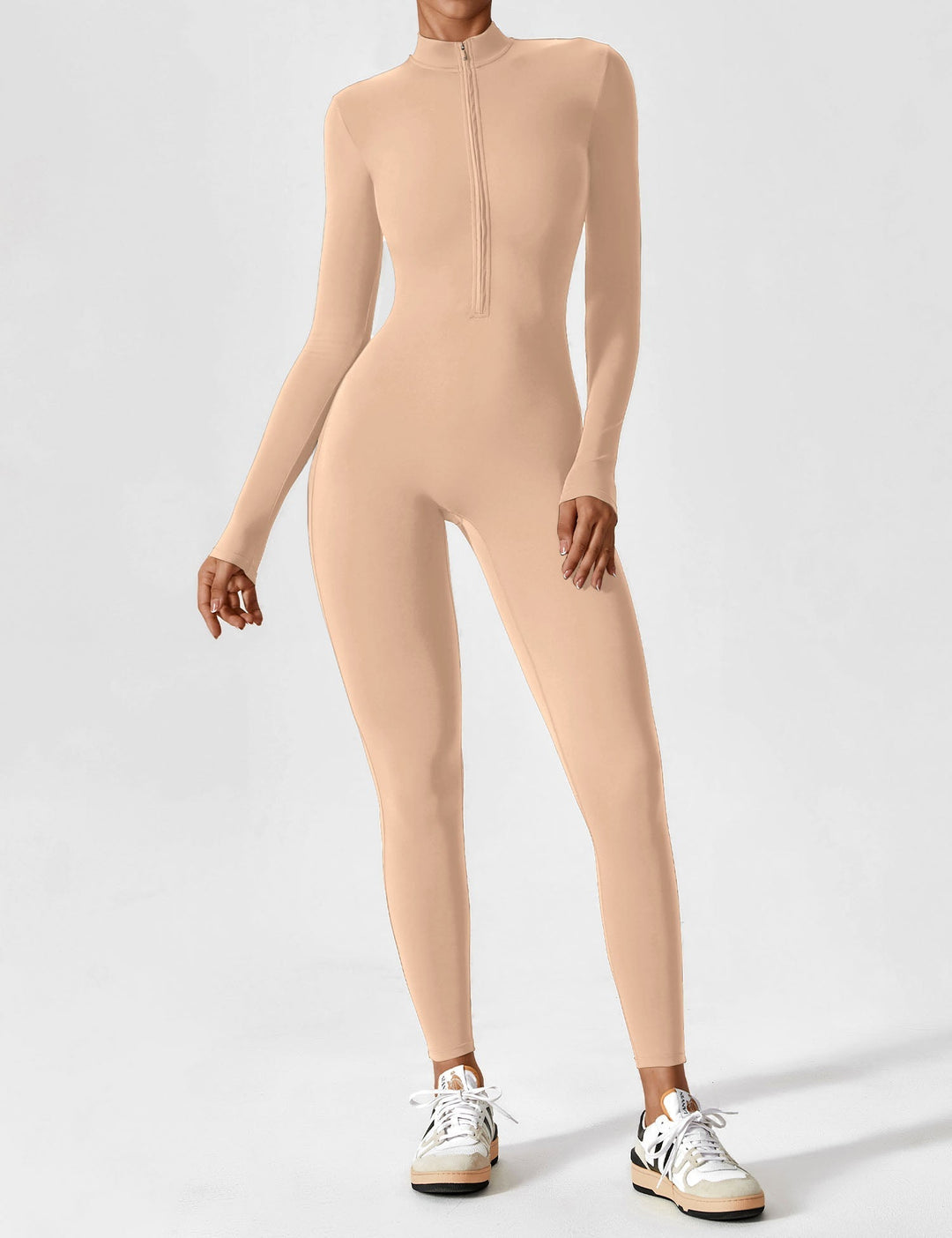 Woman meditating in a white long sleeve zip lounge set, peaceful summer moment