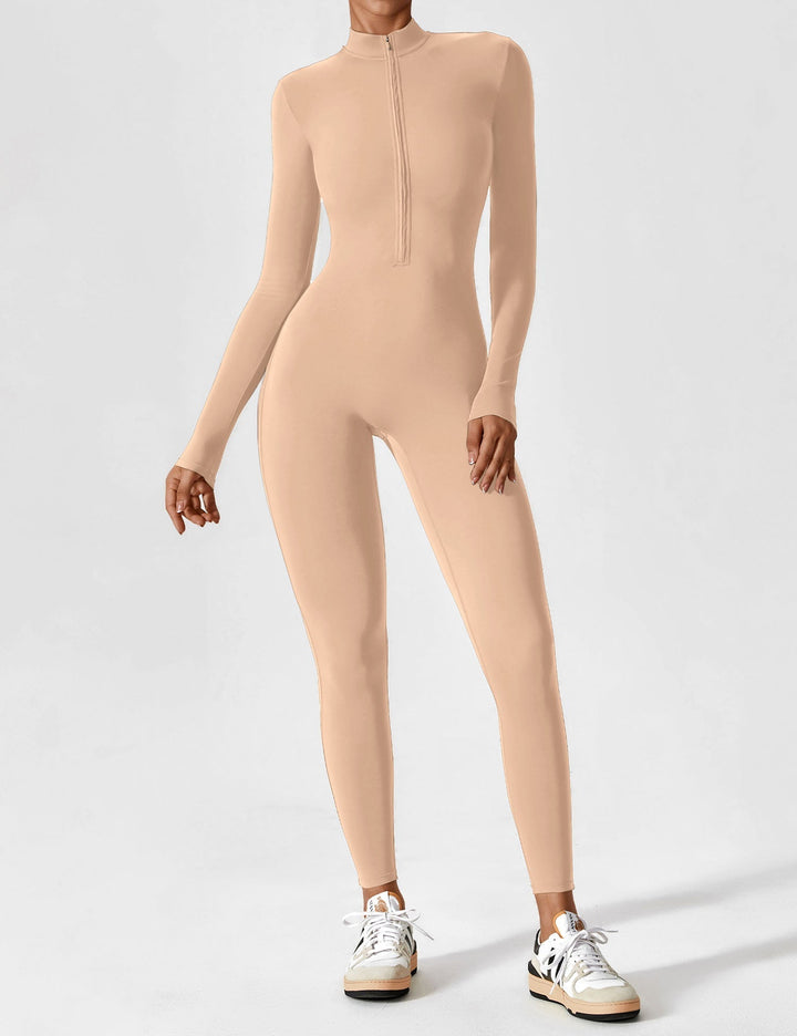 Woman meditating in a white long sleeve zip lounge set, peaceful summer moment