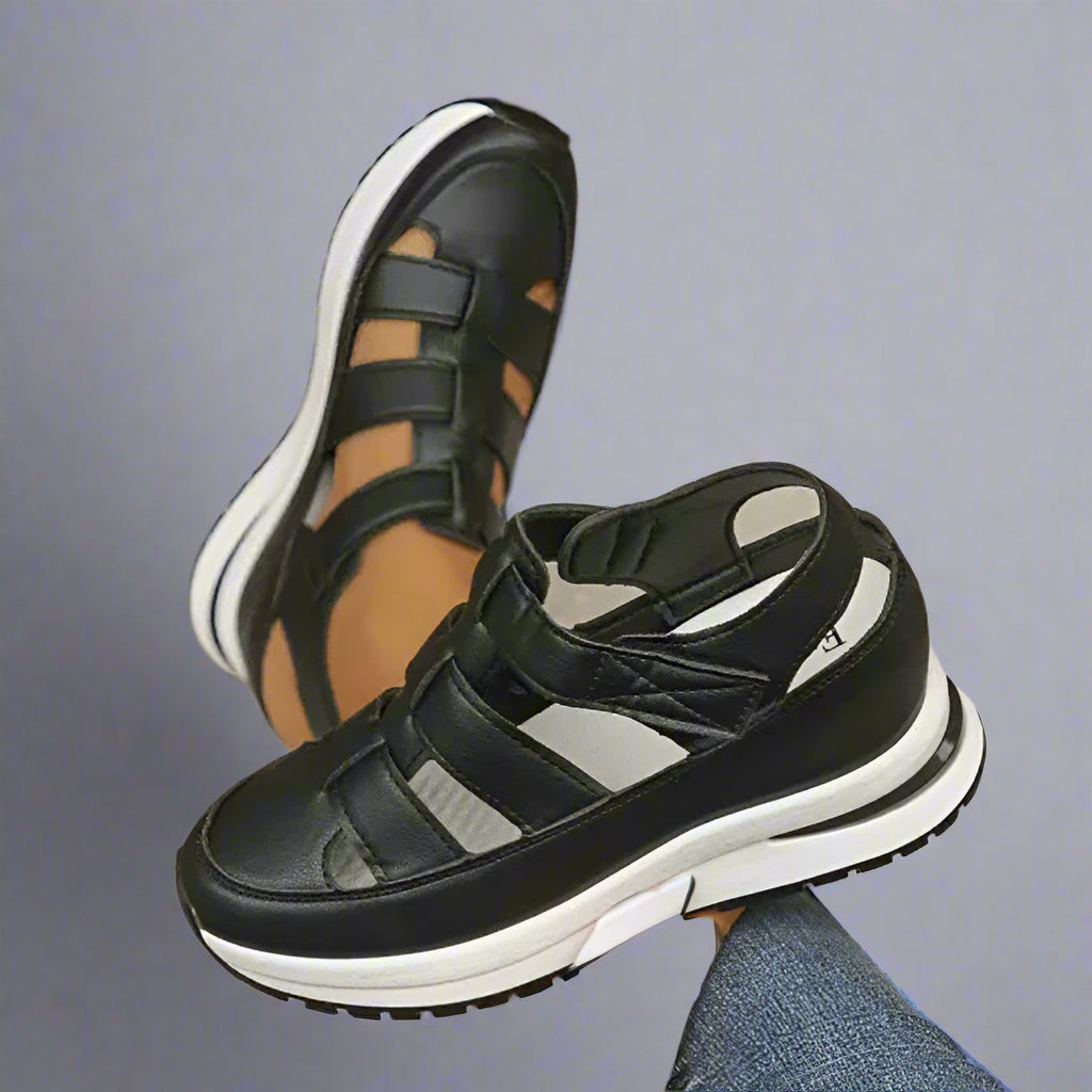 Stylish women's cutout platform sneakers in a light color, showcasing a trendy design for spring and summer footwear.