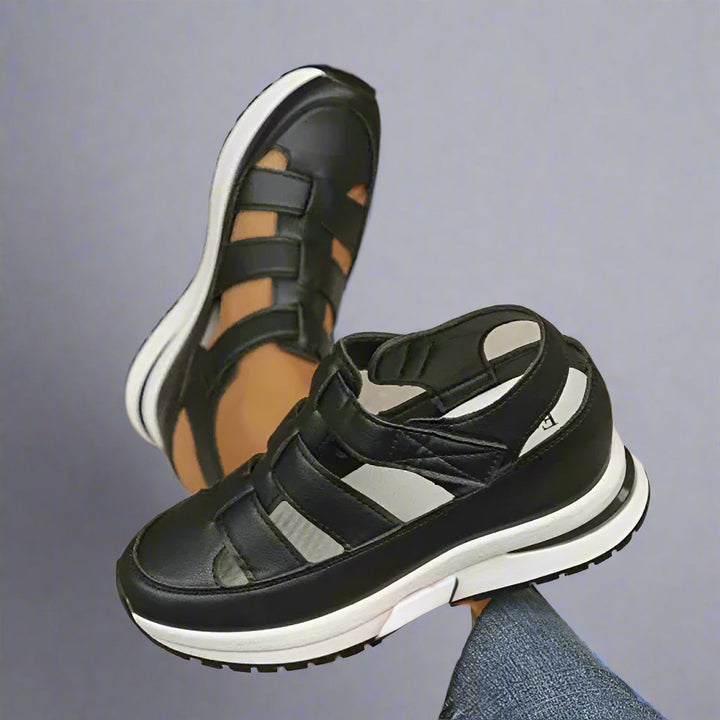 Stylish women's cutout platform sneakers in a light color, showcasing a trendy design for spring and summer footwear.