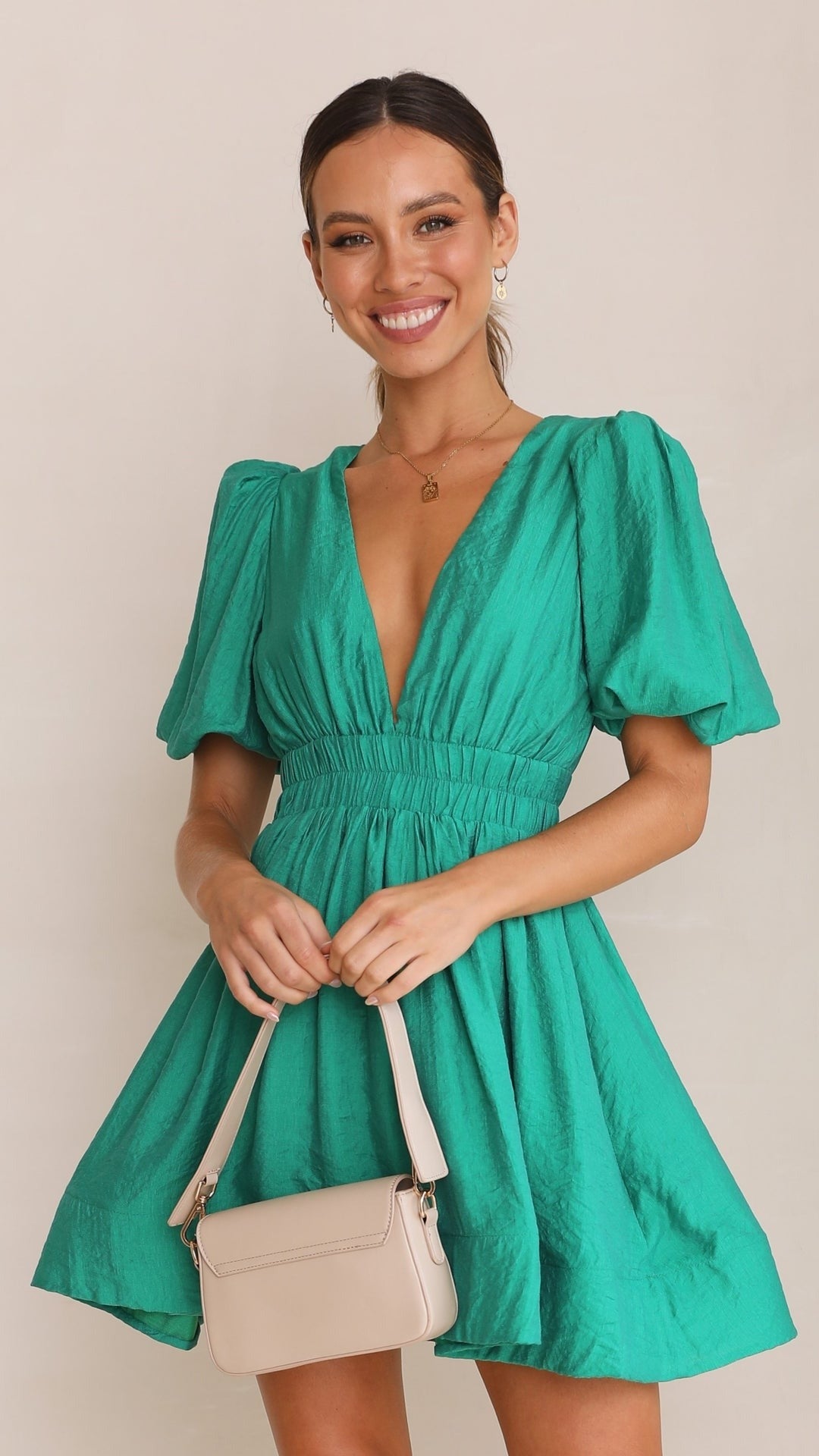 Casual women's blue denim mini dress with stylish puff sleeves, versatile day dress