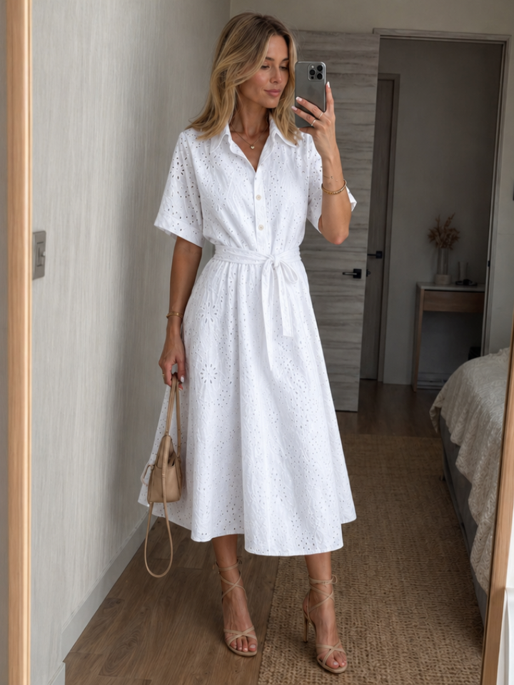Women's white short sleeve button-front midi dress with waist tie. Perfect for summer, casual, or elegant wear.