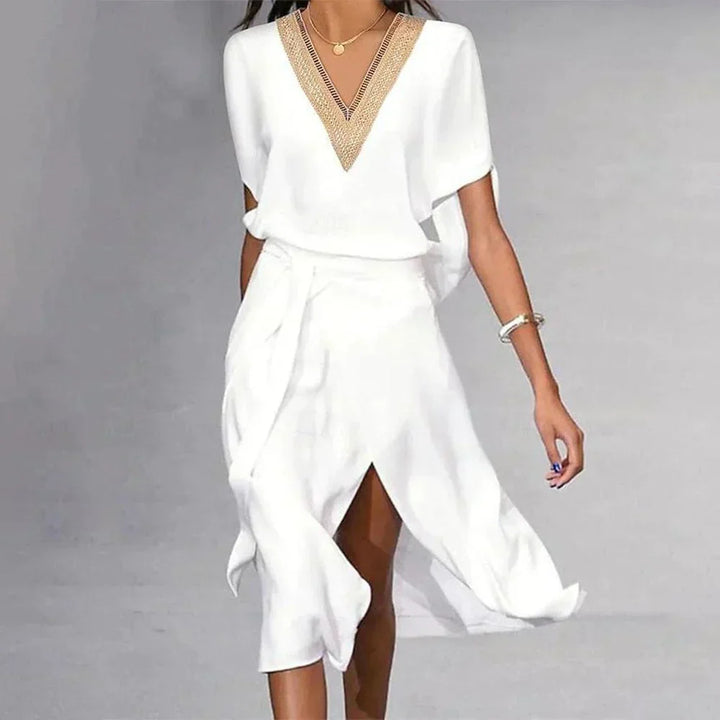 Comfortable white V-neck midi dress for women, ideal as a flowy summer day dress