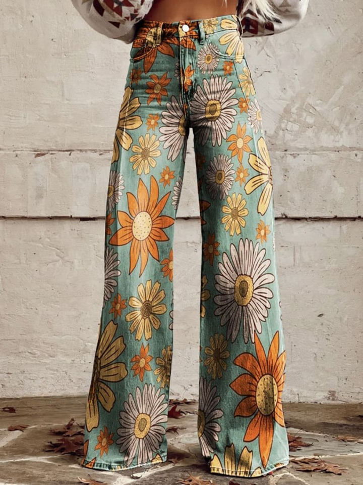 Women's wide leg denim jeans with bold floral print, high-waisted for casual fashion wear