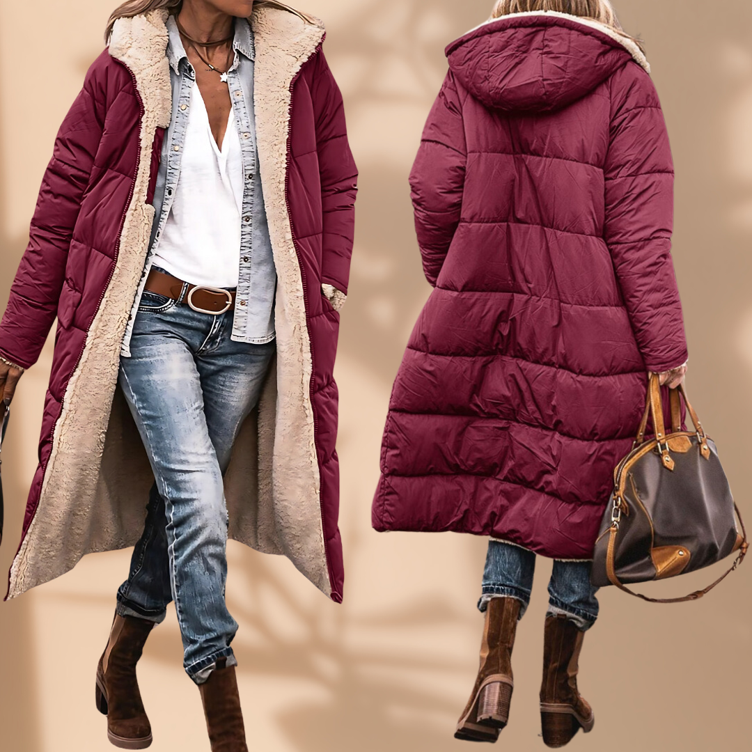 Women's windproof & waterproof insulated winter jacket for cold weather outdoor activities.