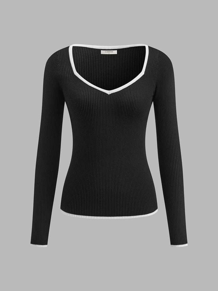 Cozy women's long sleeve knit sweater in a winter style with distinct contrast trim