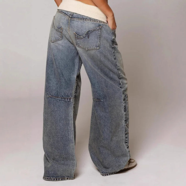 Trendy women's Y2K baggy jeans with a comfortable ribbed waist and wide leg cut, ideal for streetwear fashion.