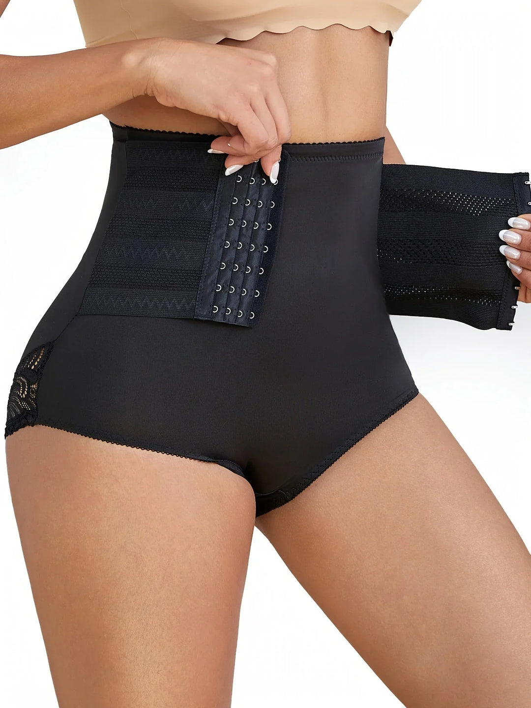 Comfortable high-waisted lace shapewear briefs with compression for women. Elegant tummy control underwear.