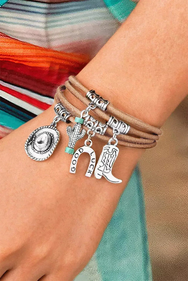 Women's multi-layered silver western charm bracelet with hat & boot details, perfect for cowgirl style.