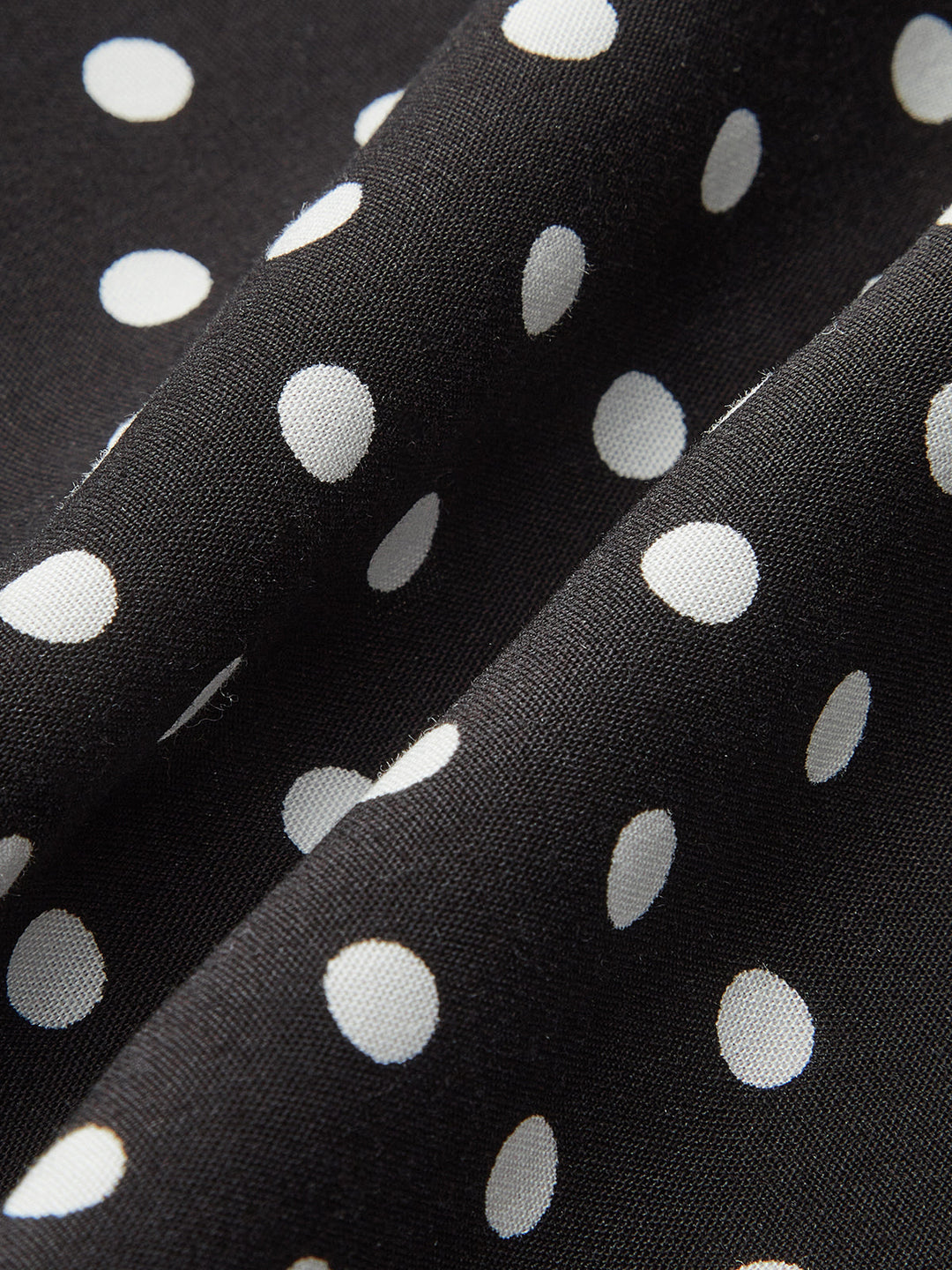 Sophisticated polka dot summer maxi dress, women's V-neck, short sleeve, and elegant lace details.