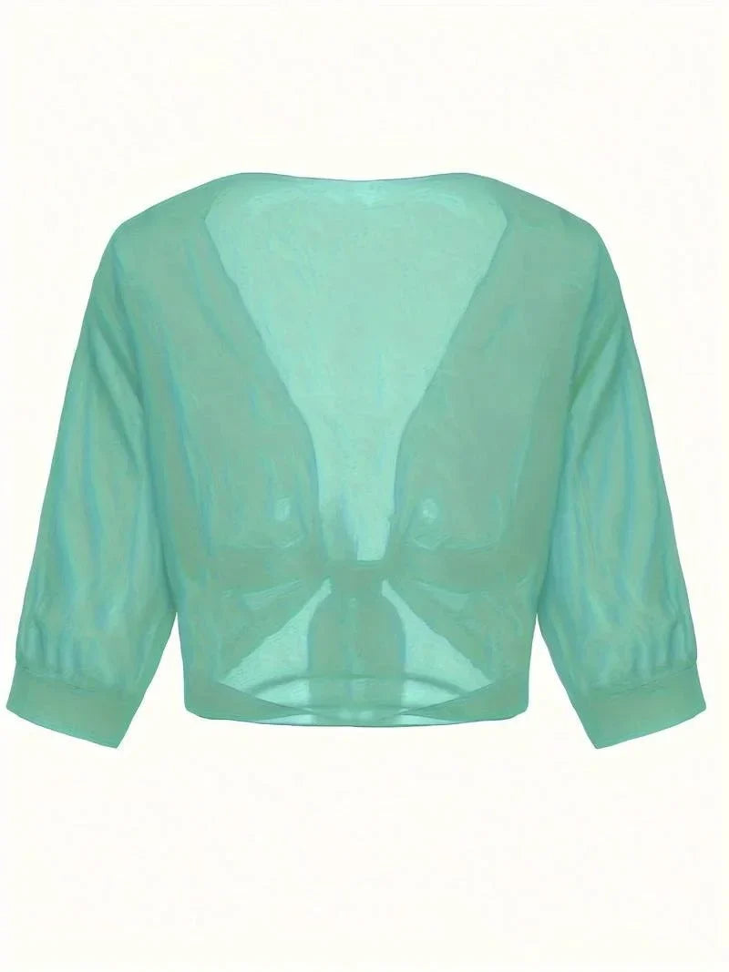 Breathable women's sheer 3/4 sleeve blouse, tie-front, perfect for sunny summer days.