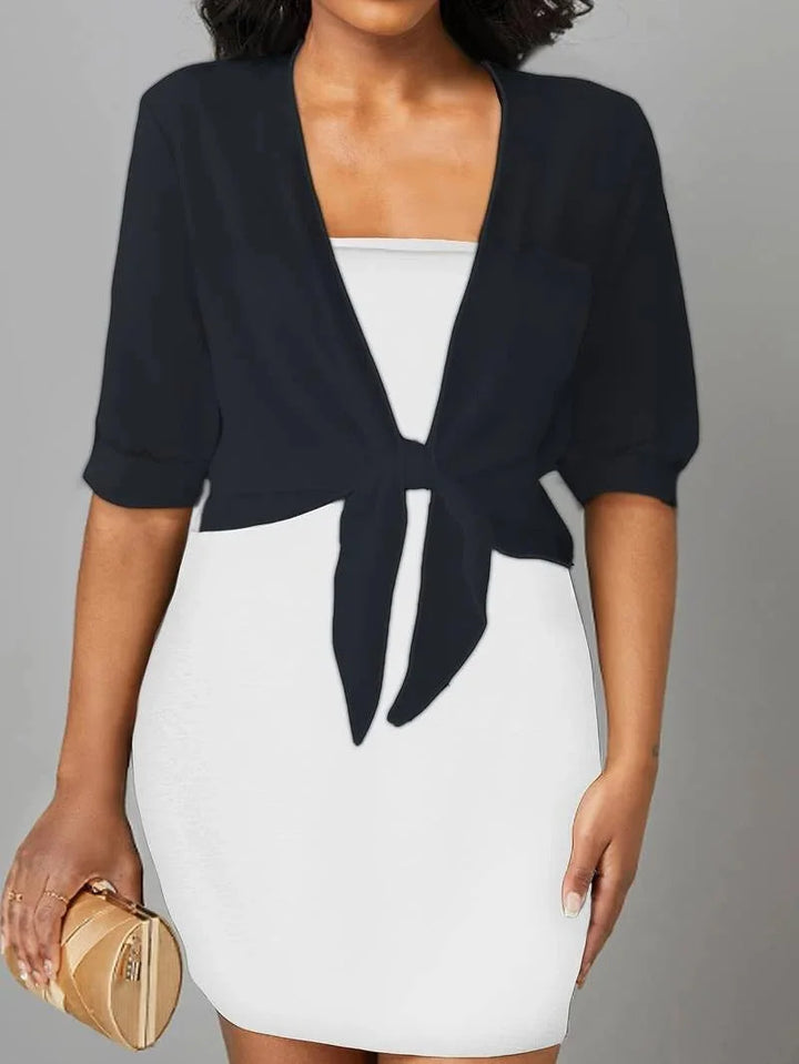 Stylish women's sheer tie-front top with 3/4 sleeves, ideal for resort wear and layering.