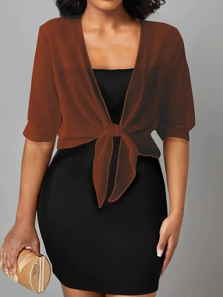Versatile open-front sheer women's blouse, 3/4 sleeves, perfect as a stylish layering piece.