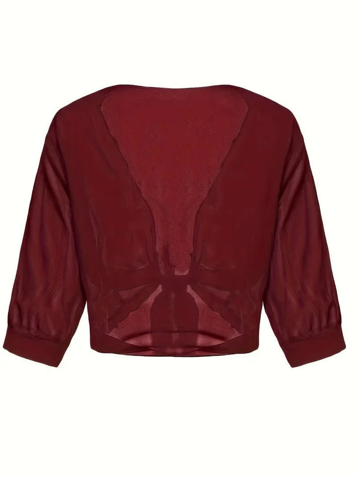 Lightweight sheer women's blouse, 3/4 sleeves, versatile tie-front style, comfortable and trendy.