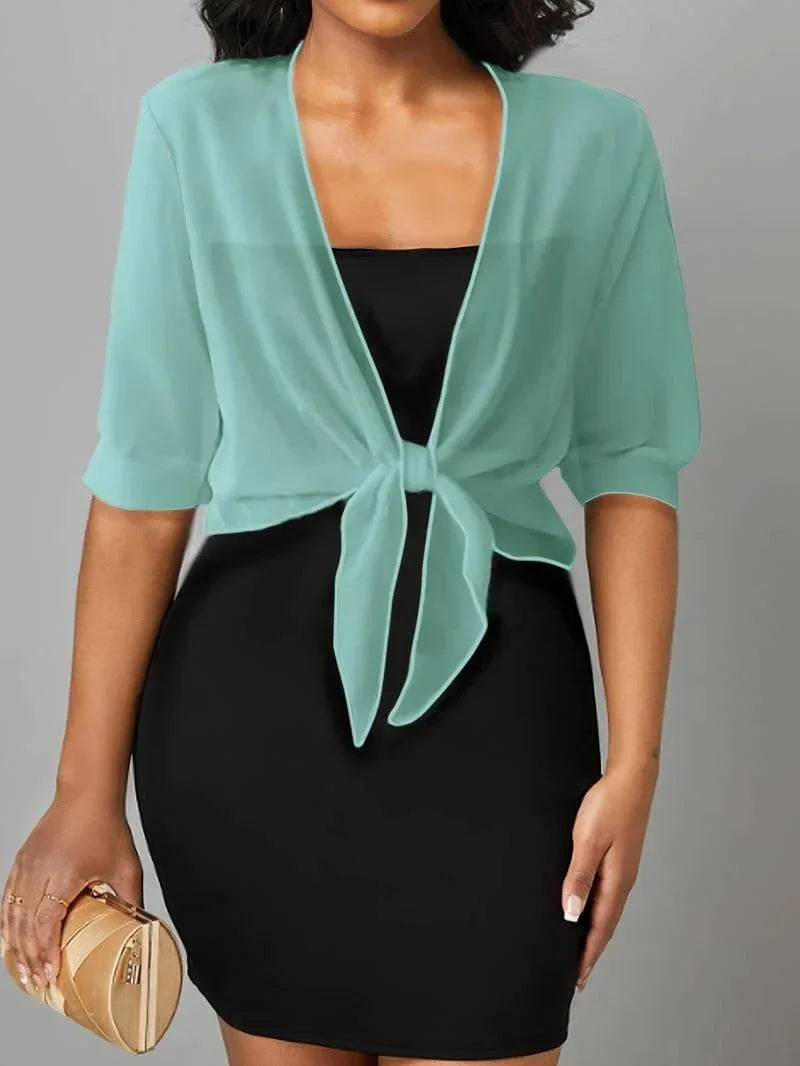 Chic women's sheer tie-front blouse with 3/4 sleeves, great for casual or elegant spring outfits.