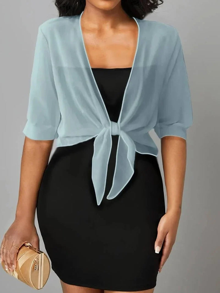 Elegant 3/4 sleeve sheer blouse for women, tie-front design, versatile and fashionable.