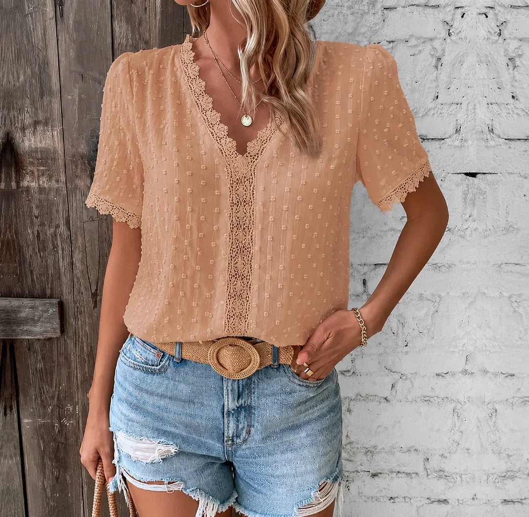 Women's elegant Swiss dot V-neck lace blouse with short sleeves, perfect for spring and summer fashion.