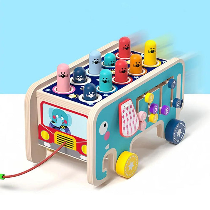 Vibrant wooden Whack-A-Mole toy for babies & toddlers, a developmental activity for sensory & cognitive skills.
