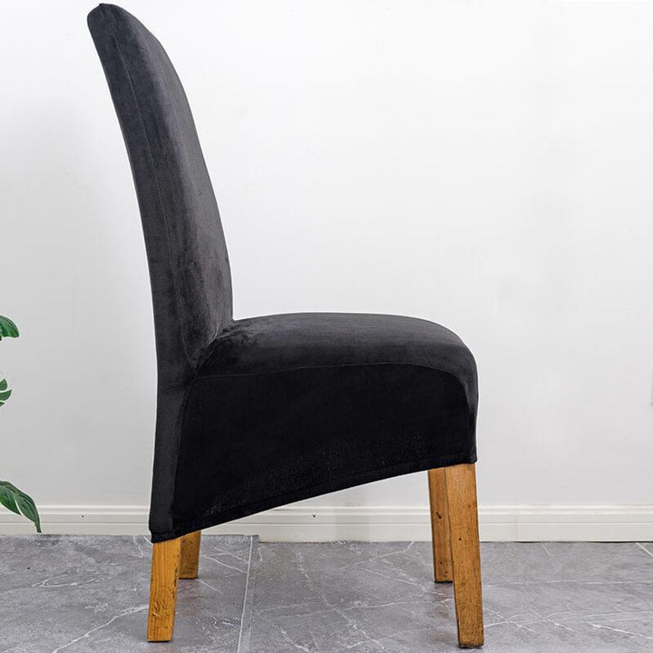 Transformative XL stretch velvet dining chair cover, durable & chic look for dining rooms.