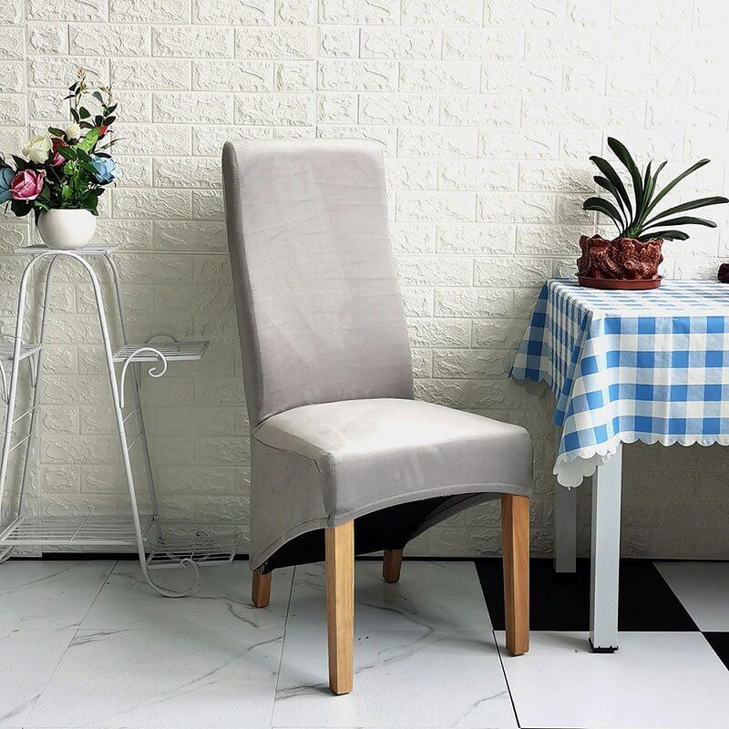 Plush XL velvet dining chair cover, luxurious comfort, chic update for any dining space.