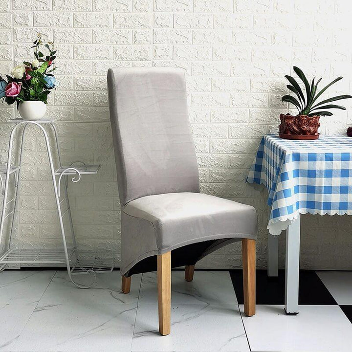 Plush XL velvet dining chair cover, luxurious comfort, chic update for any dining space.