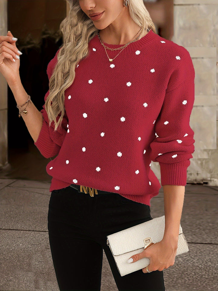 Stylish women's polka dot sweater. Warm, round-neck top for autumn and winter fashion.