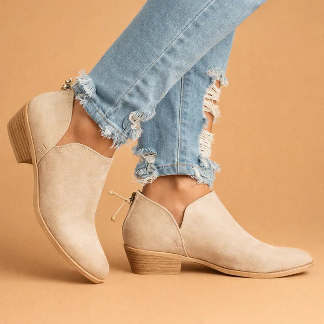 Zofia women's elegant slip-on ankle boots with a stylish block heel, perfect for everyday chic or work.